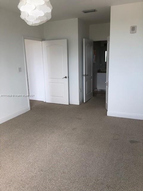 2701 Southwest 3rd Avenue, Unit 705 Miami, FL 33129 - Photo 6 of 10 an empty room with a bathroom