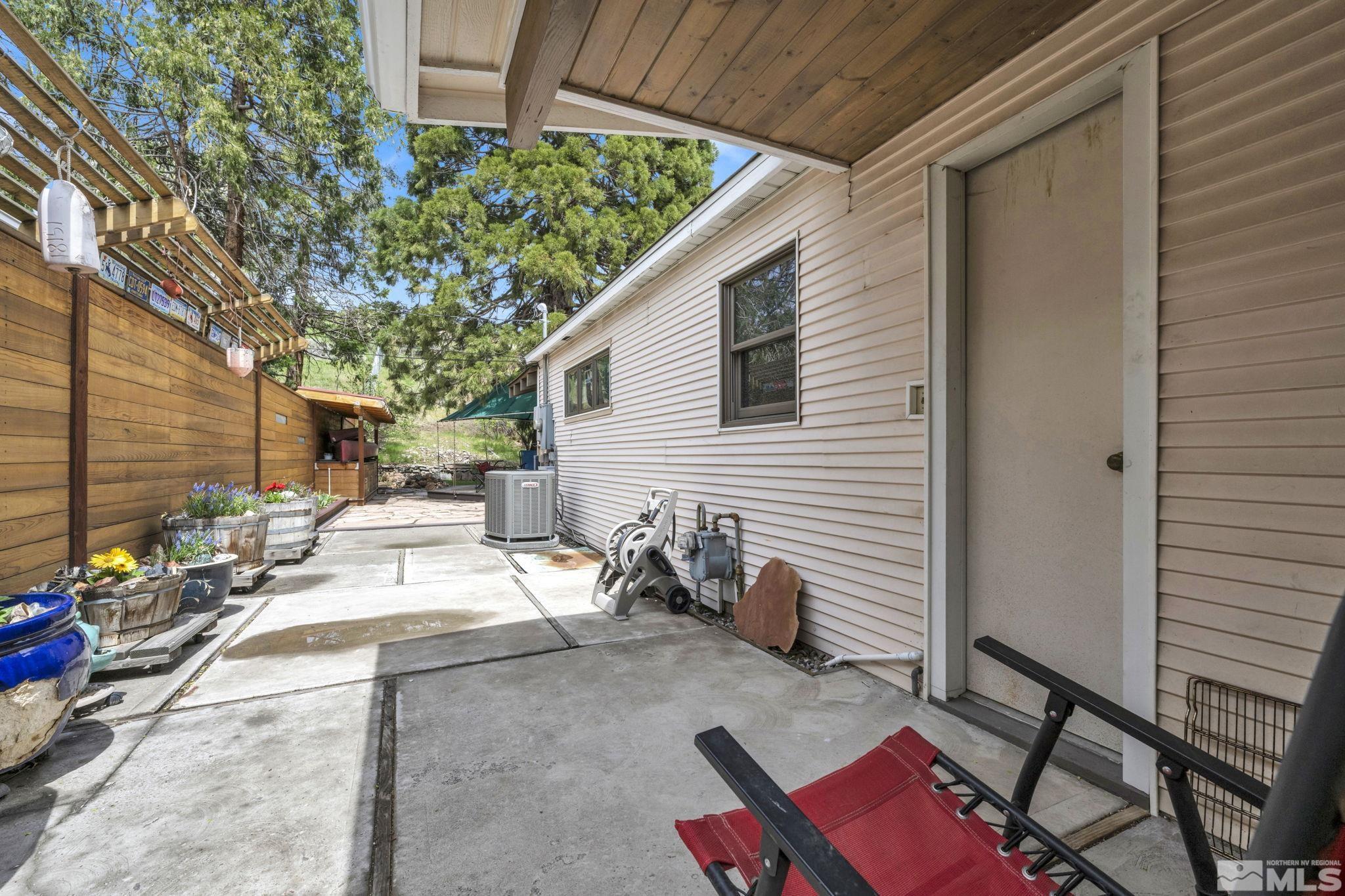 1925 Elmcrest Drive Reno, NV 89503 - Photo 13 of 32 a view of a backyard with a sitting area