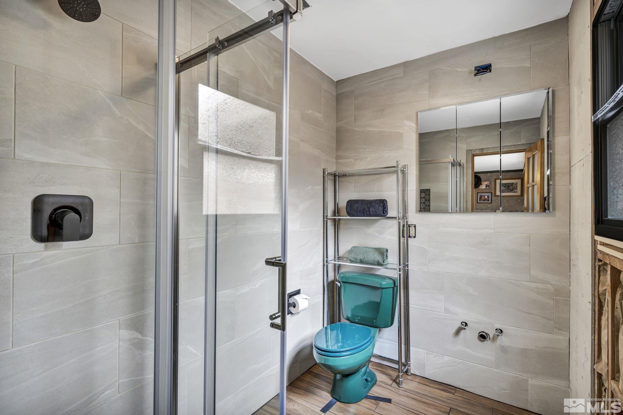 1925 Elmcrest Drive Reno, NV 89503 - Photo 20 of 32 a bathroom with a tub and shower