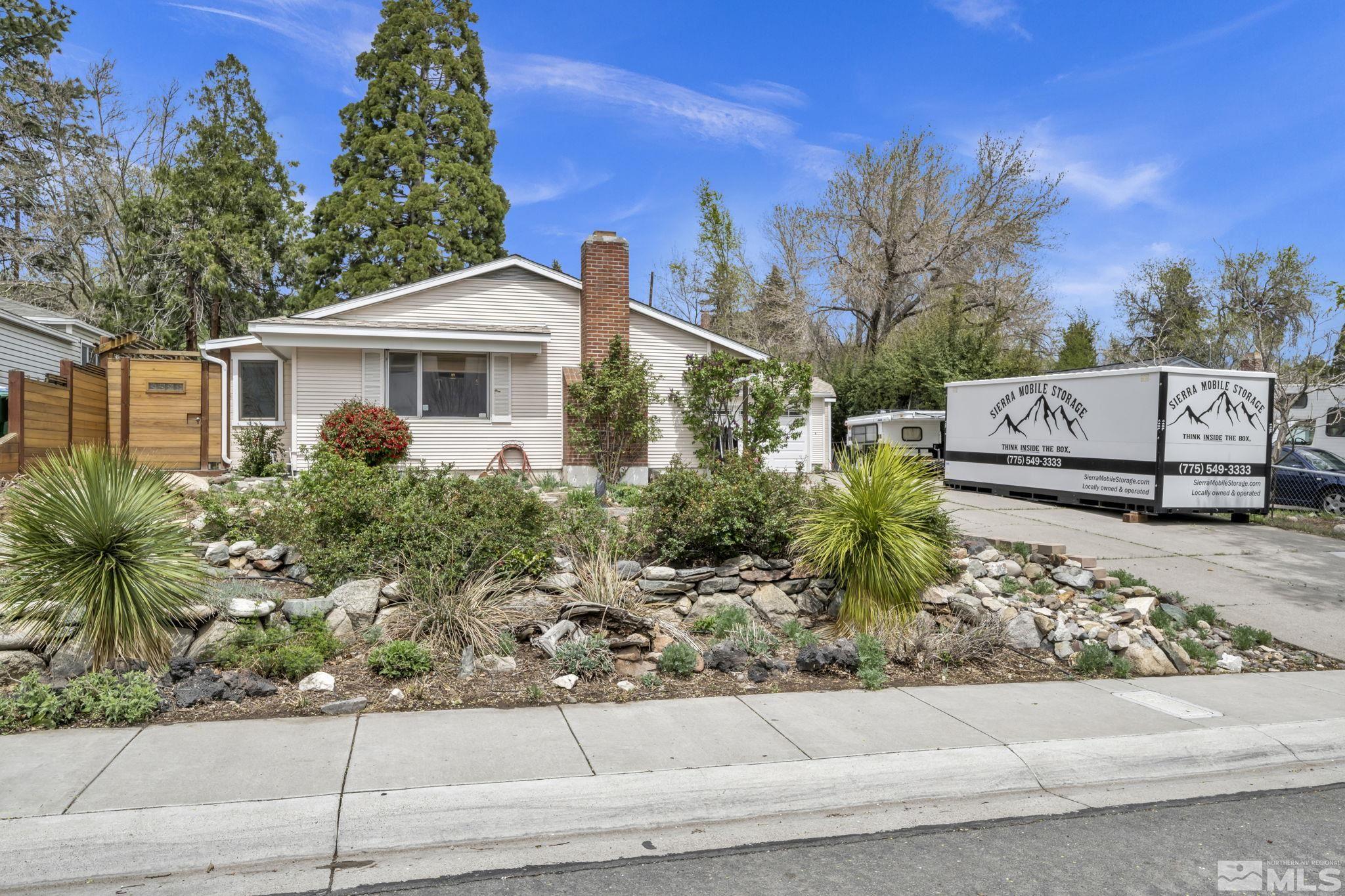 1925 Elmcrest Drive Reno, NV 89503 - Photo 2 of 32 front view of a house with a yard