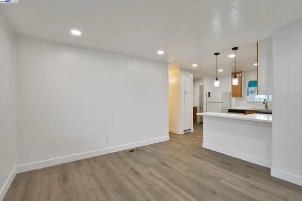 a bedroom with furniture and a table