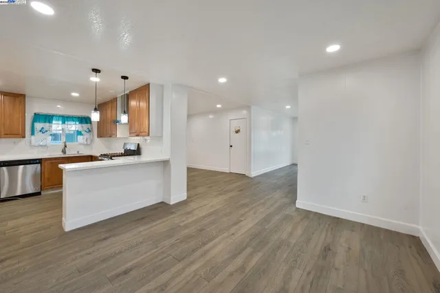 a bedroom with a bed and dresser