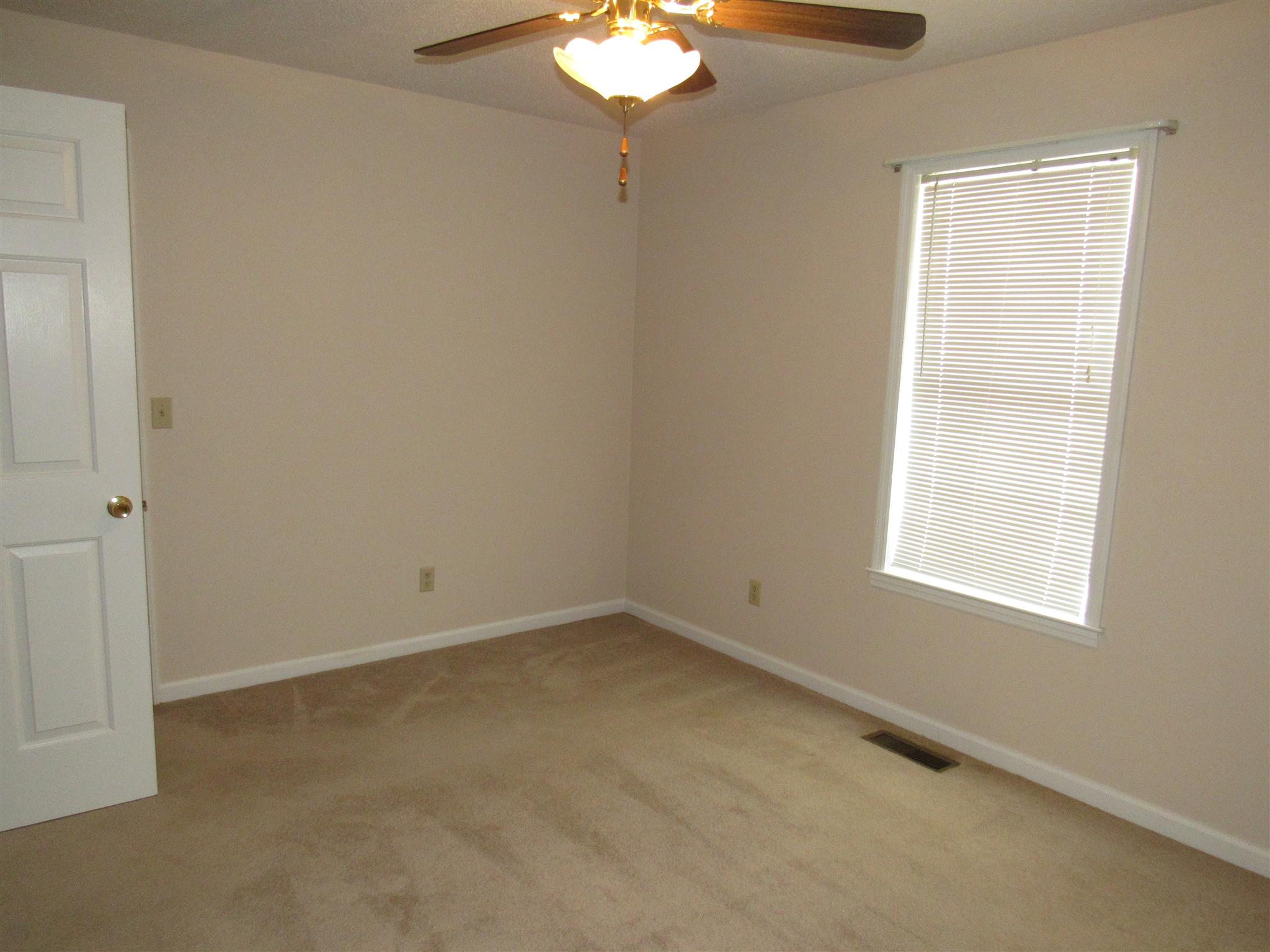 275 Jones Road Taft, TN 38488 - Photo 6 of 26 an empty room with a window