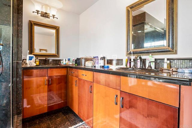 a bedroom with a bed and a closet