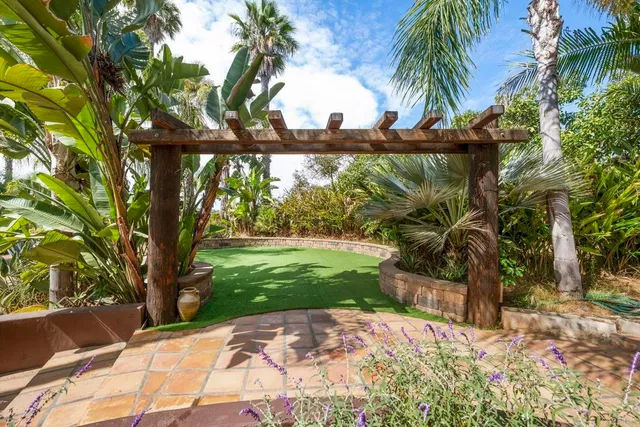 a kitchen with cabinets and stainless steel appliances