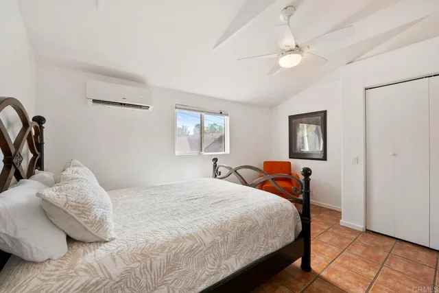 a living room with furniture or couch and a flat screen tv
