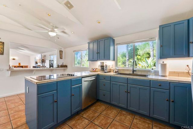 a view of a chairs and tables in patio
