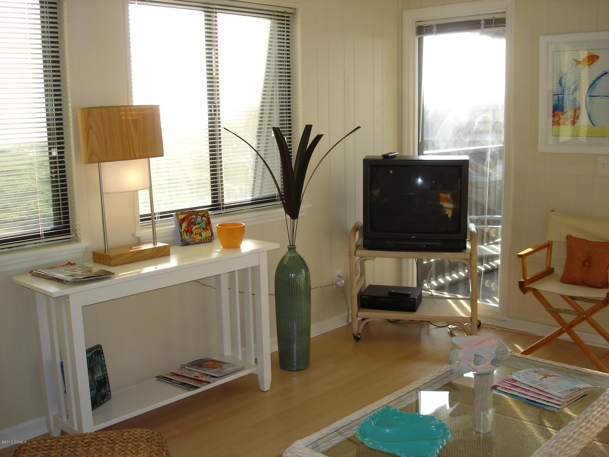 2008 East Fort Macon Road, Unit F18 SOUTHWINDS Atlantic Beach, NC 28512 - Photo 3 of 13 lots of windows to enjoy the views