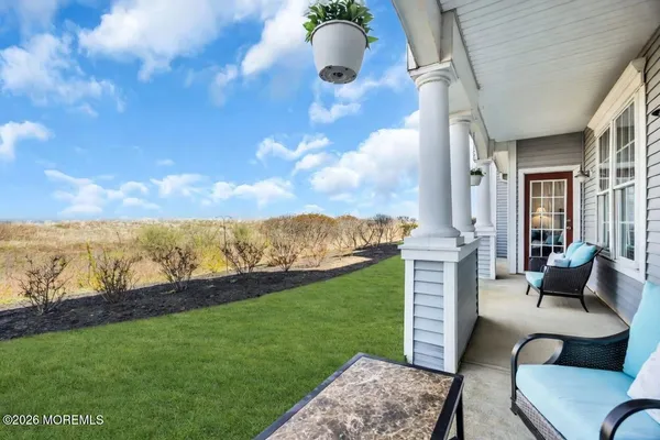 a view of an outdoor space with garden and seating