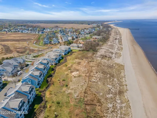 a view of a city with an ocean