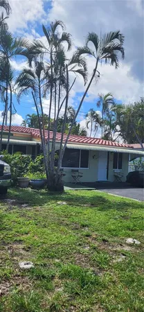 a car parked in front of a house