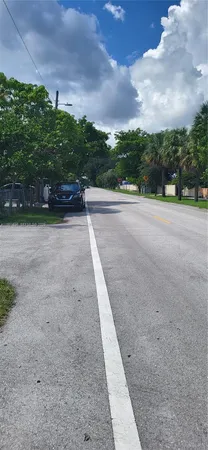 a view of cars parked in a yard