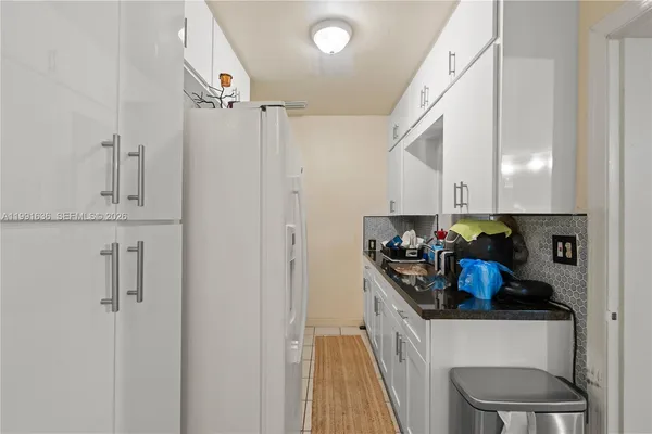 a view of hallway with washer and dryer