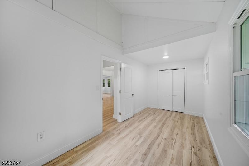 330 Springbrook Trail Sparta, NJ 07871 - Photo 14 of 41 a view of hallway with wooden floor