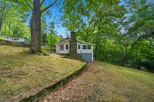 a house with trees in front of it