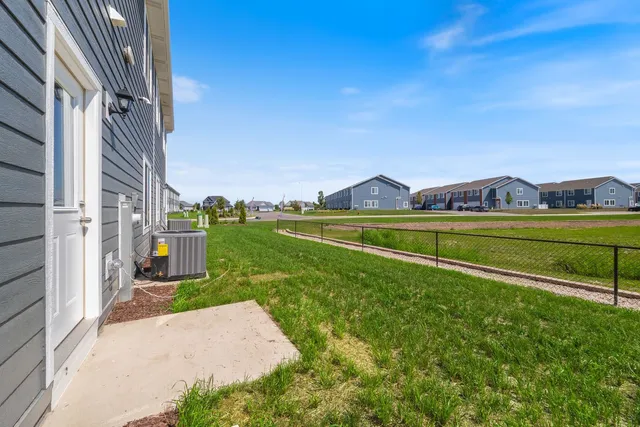 a view of a house with a big yard