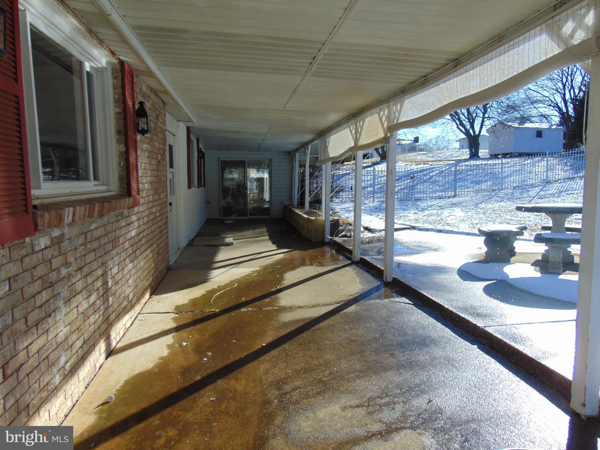 11904 Caspian Road Kingsville, MD 21087 - Photo 14 of 15 Expansive Rear Patio Overlooks Pool