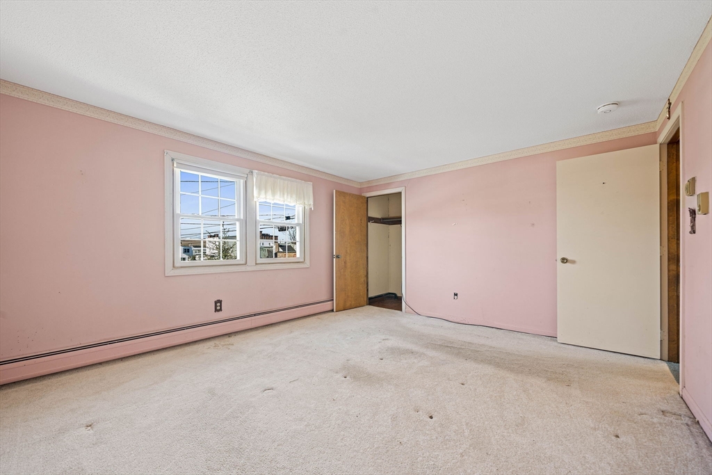 4 Shawsheen Road, Unit 2 Lawrence, MA 01843 - Photo 17 of 35 an empty room with windows