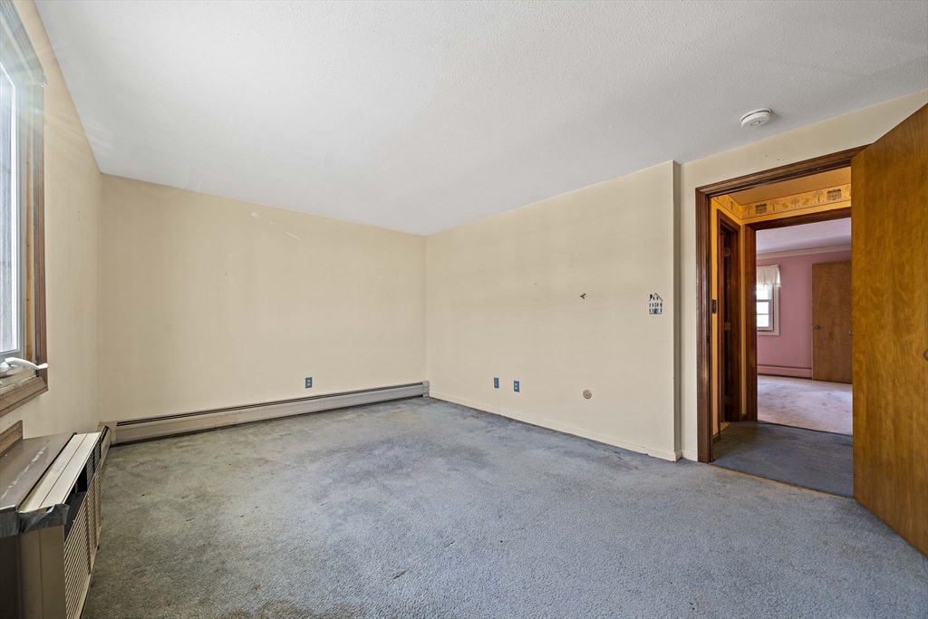 4 Shawsheen Road, Unit 2 Lawrence, MA 01843 - Photo 20 of 35 an empty room with a natural light