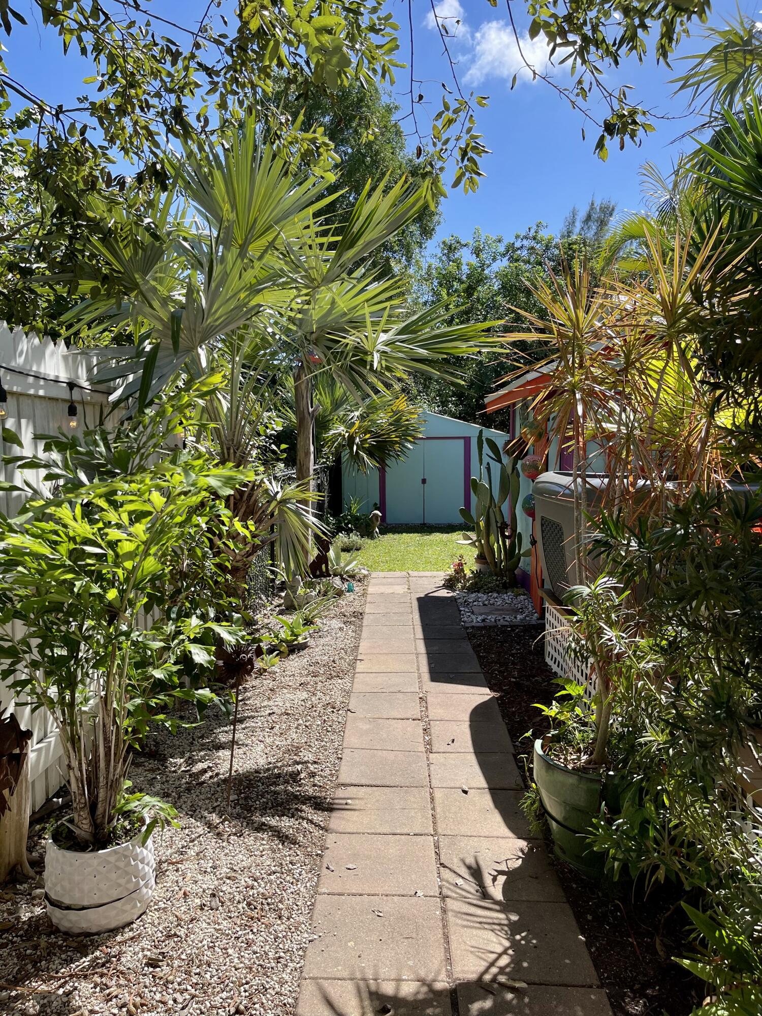 31240 Ave D Big Pine Key, FL 33043 - Photo 12 of 42 a park with potted plants and large trees