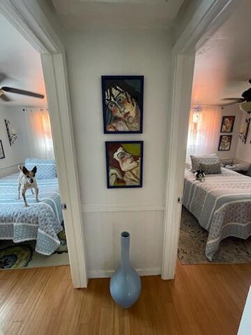 31240 Ave D Big Pine Key, FL 33043 - Photo 28 of 42 a bedroom with a bed and a painting on the wall