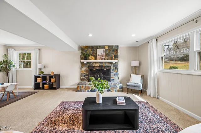 a bedroom with a bed a couch and dresser