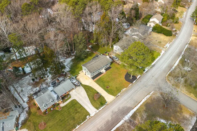 a view of a back yard of the house