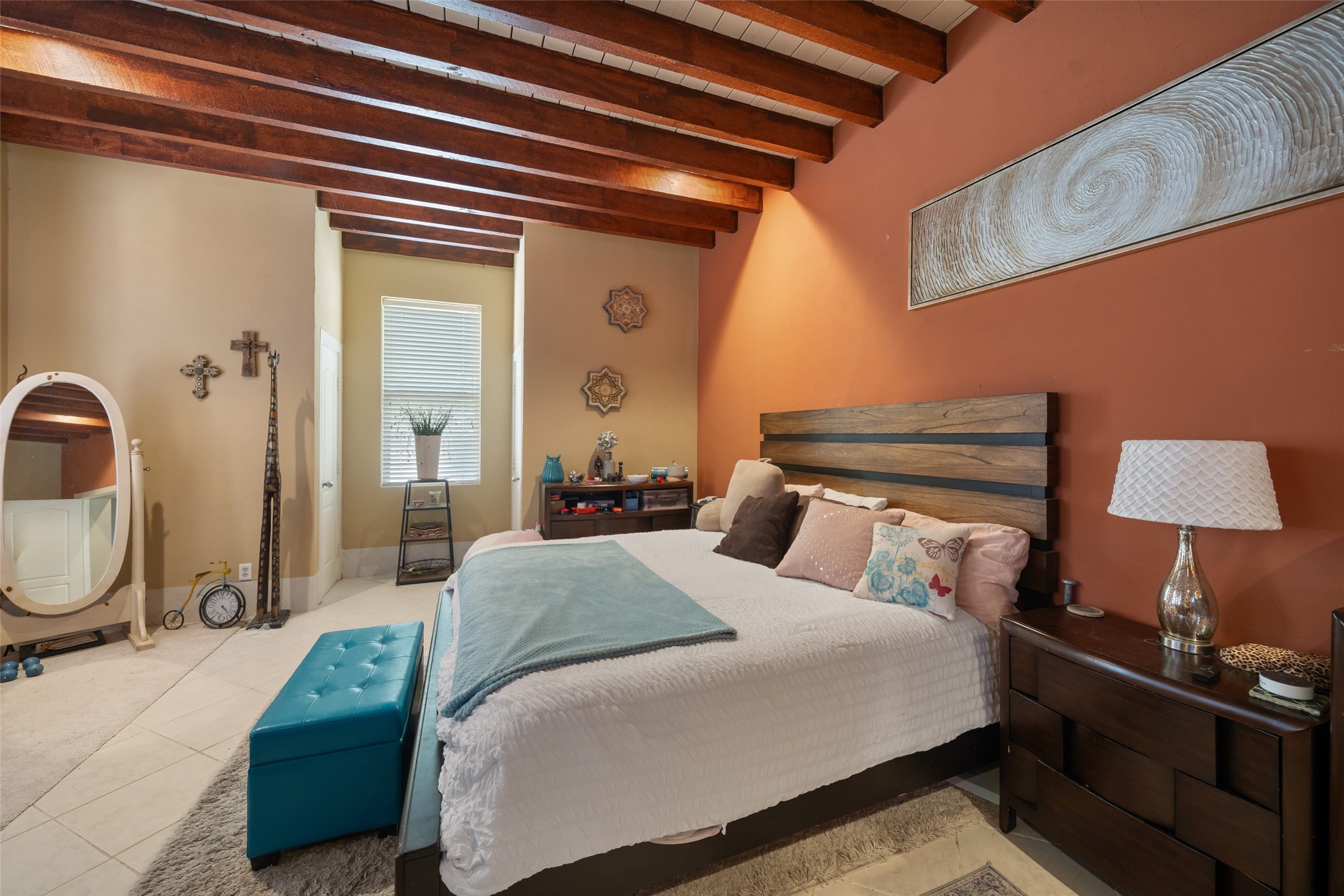 614 Pine Gully Road Seabrook, TX 77586 - Photo 33 of 49 a bedroom with a bed a lamp and window