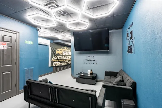 a kitchen with stainless steel appliances granite countertop a stove and a refrigerator