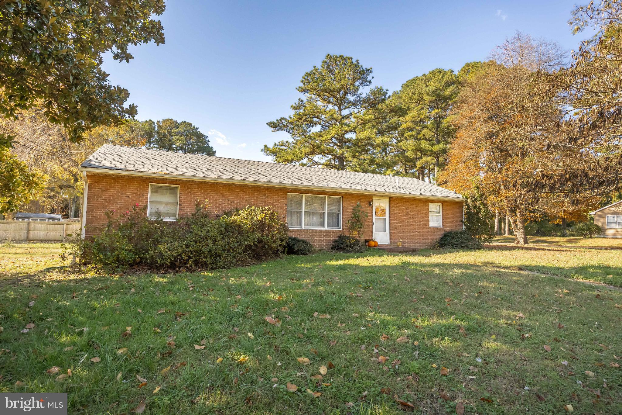136 Marvel Road Salisbury, MD 21801 - Photo 3 of 42 Charming brick home with lush greenery.