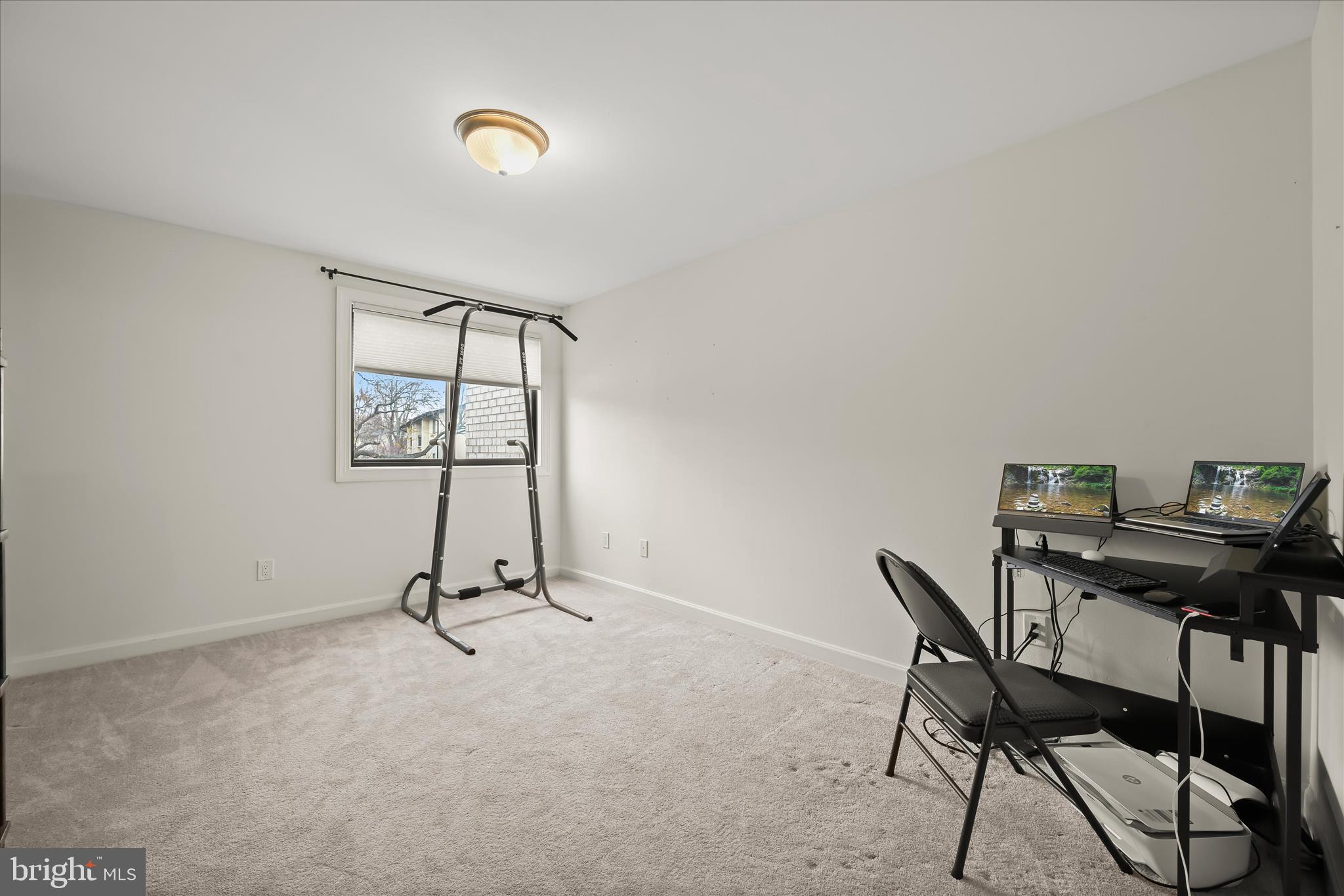 10851-10859 Amherst Avenue, Unit 202 Silver Spring, MD 20902 - Photo 19 of 32 a view of a workspace with furniture