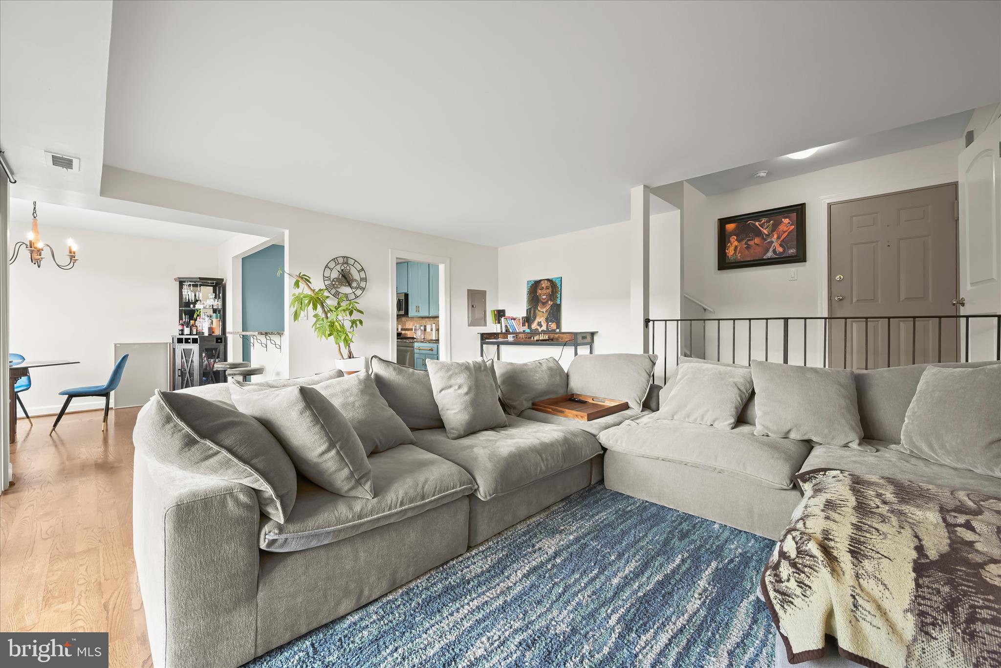 10851-10859 Amherst Avenue, Unit 202 Silver Spring, MD 20902 - Photo 32 of 32 a living room with furniture and a couch