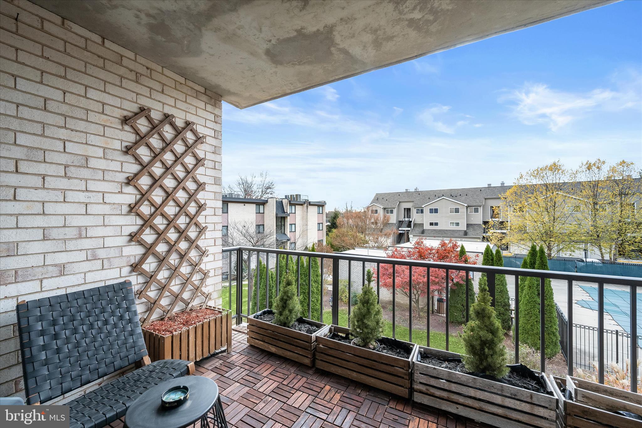 10851-10859 Amherst Avenue, Unit 202 Silver Spring, MD 20902 - Photo 7 of 32 a view of a balcony with city view