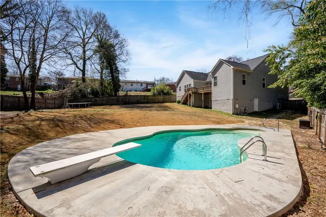 a view of outdoor space yard and swimming pool