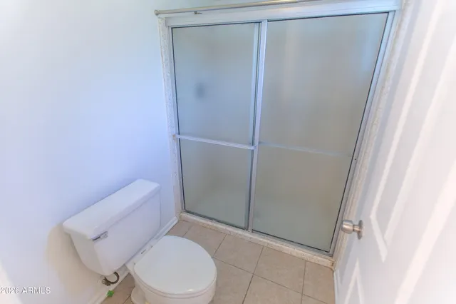 a view of a backyard of the house