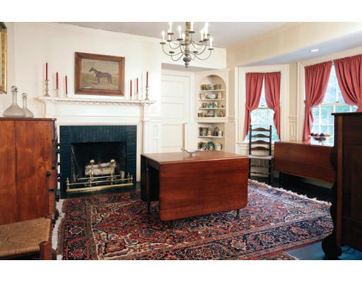 42 Crafts Road Brookline, MA 02467 - Photo 4 of 5 a living room with furniture a window and a fireplace