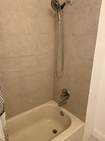a view of a bathroom with a shower