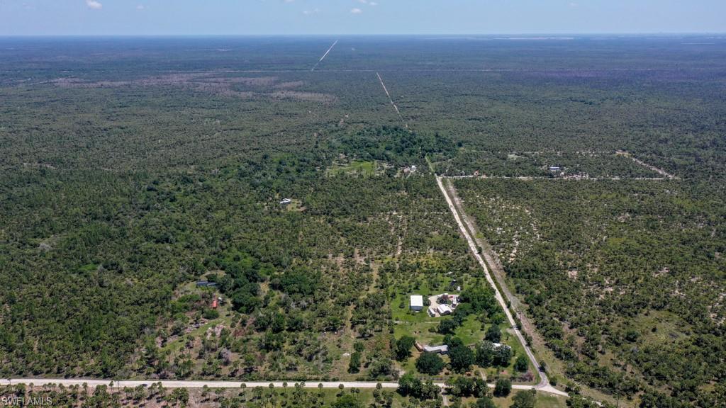 0 Benton Road Naples, FL 34117 - Photo 4 of 10 a view of a big yard