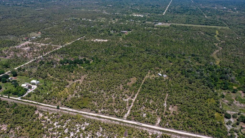 0 Benton Road Naples, FL 34117 - Photo 7 of 10 a view of a green field