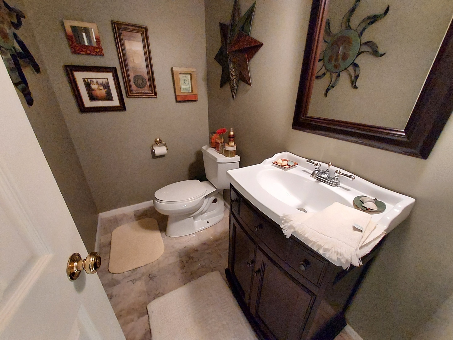 787 Oak Hill Road, Unit 467 Lake Barrington, IL 60010 - Photo 38 of 57 a bathroom with a sink mirror and toilet