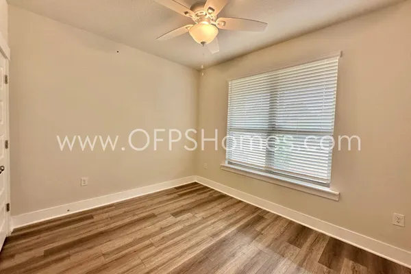 a view of a livingroom with a window