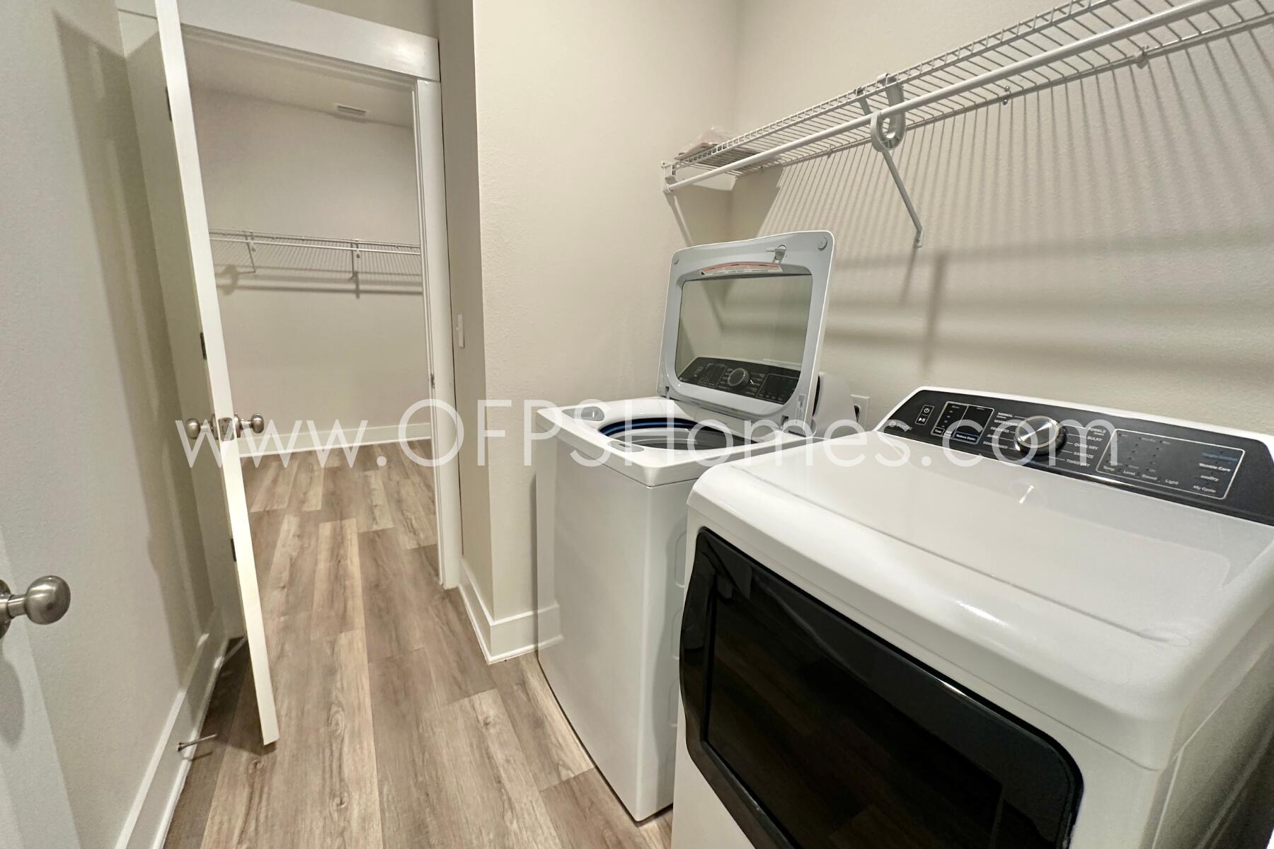 7422 Stagecoach Road Pensacola, FL 32526 - Photo 16 of 27 a utility room with dryer and washer