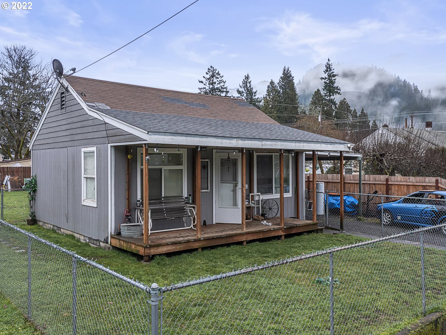 76423 River Road Oakridge, OR 97463 - Photo 1 of 30 a house view with a garden space