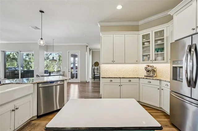 a bathroom with a sink a mirror and vanity