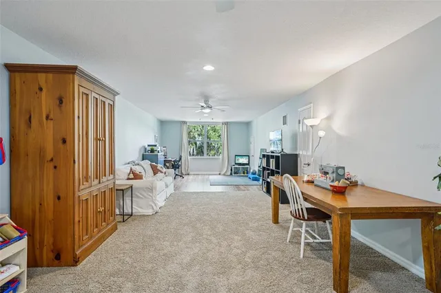 a view of a lake with houses in the back