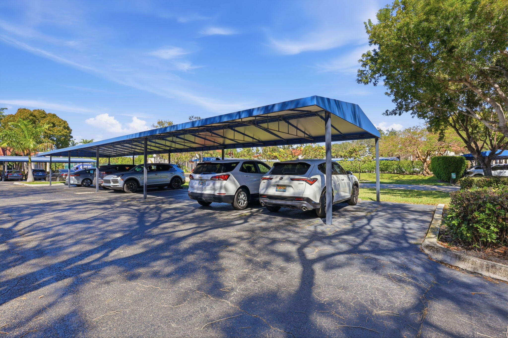 440 Northwest 67th Street, Unit 201 Boca Raton, FL 33487 - Photo 32 of 40 Covered End Parking Space