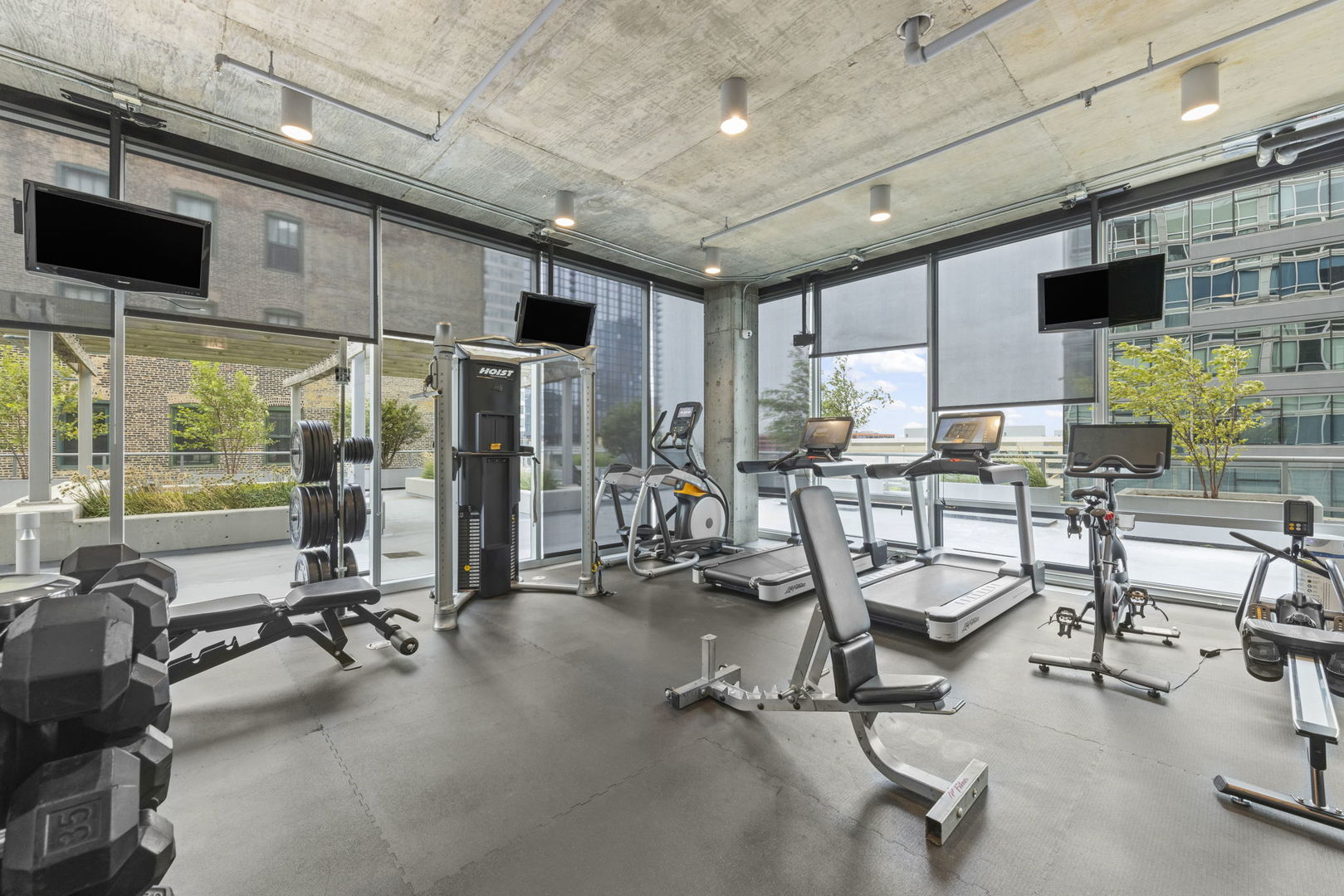 611 South Wells Street, Unit 2402 Chicago, IL 60607 - Photo 15 of 33 a view of a room with gym equipment