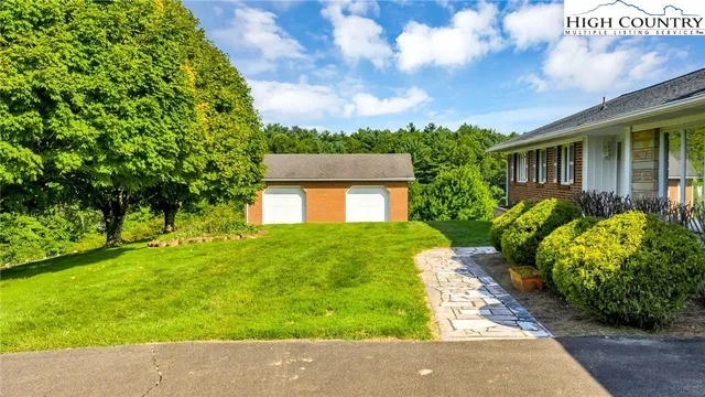 a front view of house with yard