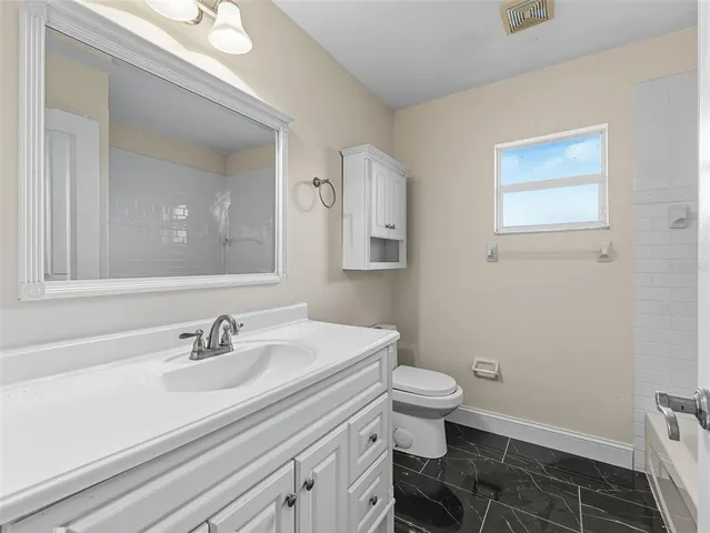 a bathroom with a bathtub