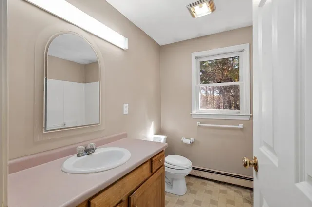 a bathroom with a sink and a toilet
